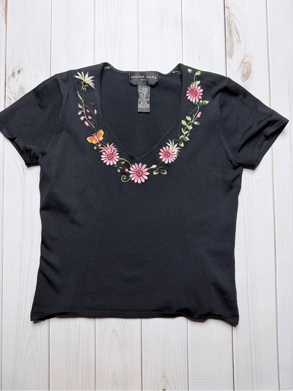 august silk Black V-Neck Tee with Pink Floral Embroidery and Butterfly Accent